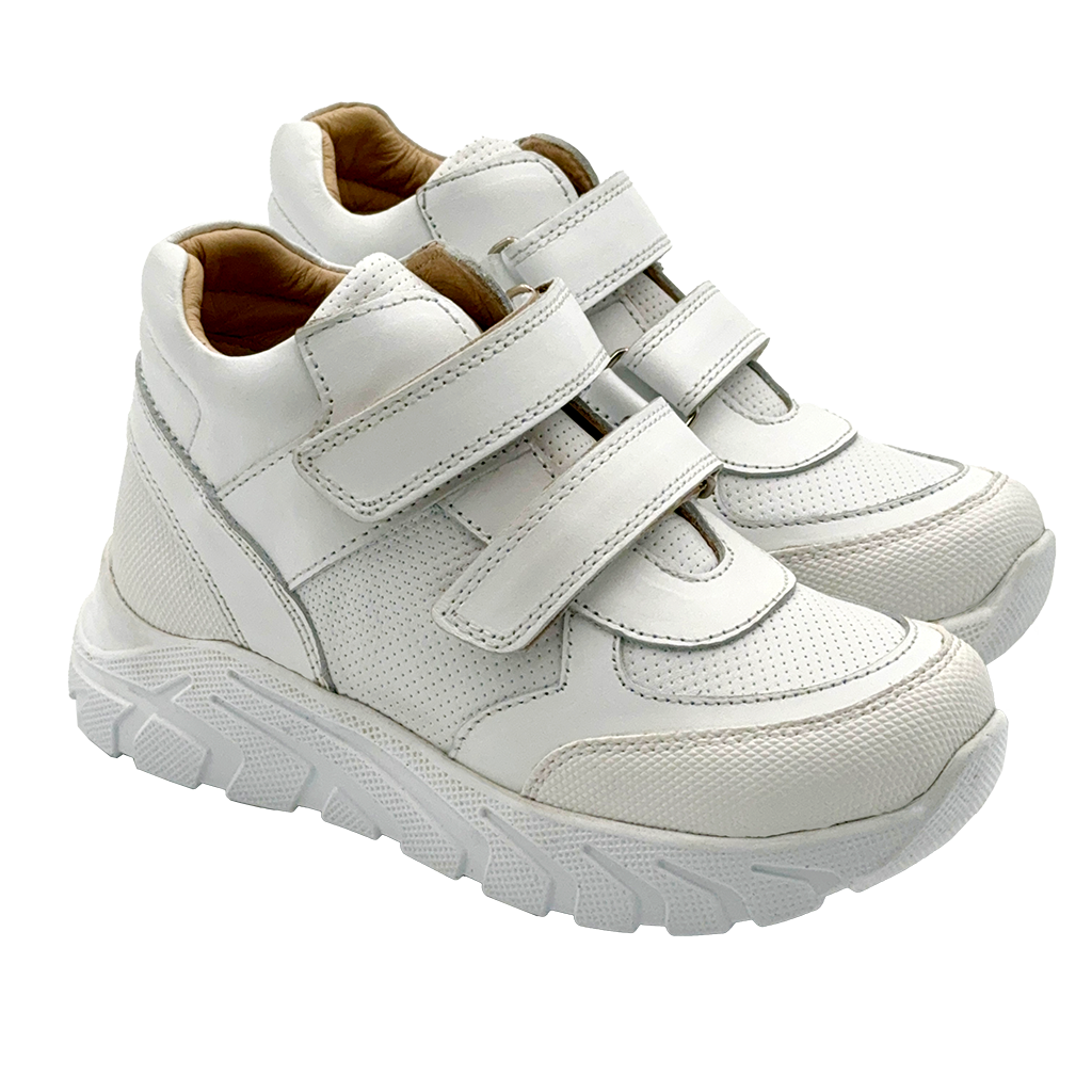 Photo of plain white supportive sneakers, designed with arch and ankle support for school dress code compliance.