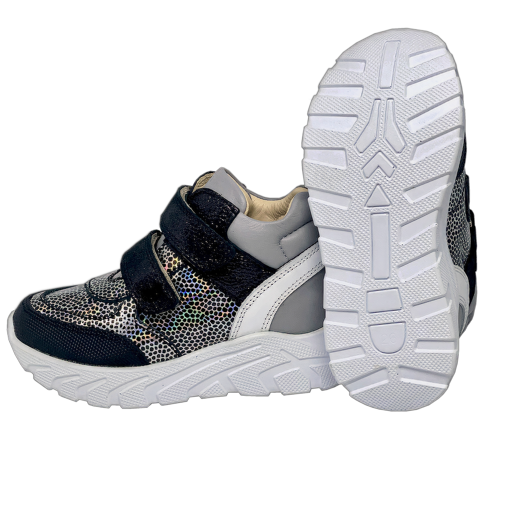 Stylish silver-black orthopedic sneakers designed for girls, featuring essential arch and ankle support for comfortable and healthy foot development.