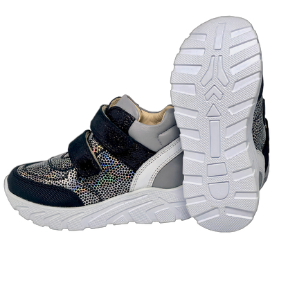 Stylish silver-black orthopedic sneakers designed for girls, featuring essential arch and ankle support for comfortable and healthy foot development.