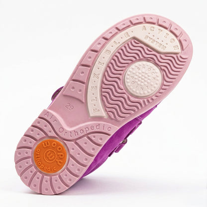 Kids’ magenta and pink orthopedic boots with Velcro straps, heart accent, scalloped trim, arch and ankle support, and Thomas heels by Woopy.