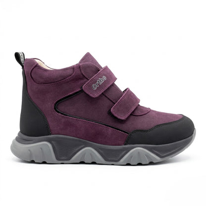 Teen girls’ orthopedic boots in dark purple and black with Velcro straps with arch and ankle support by Ortho.