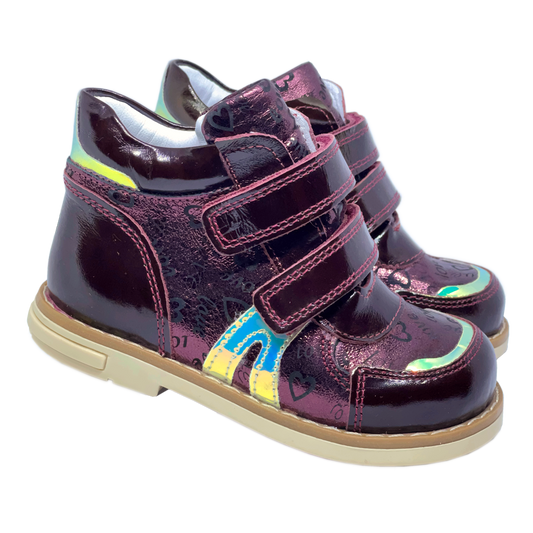 Orthopedic boots for girls with cherry color and heart patterns, featuring arch and ankle support for added comfort and stability.